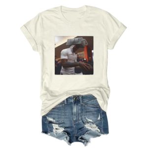 White cotton t-shirt by Icestork featuring a viral graphic of Caleb Williams wearing a cheese grater on his head while holding a football.