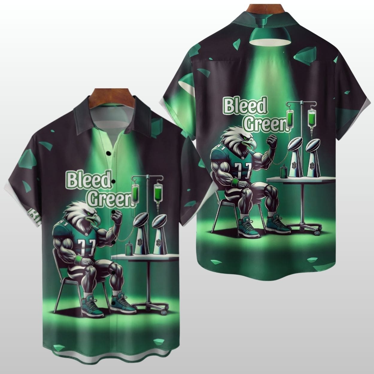 Eagles Football Bleed Green Hawaiian Shirt 2 Eagles "Bleed Green" button-down Hawaiian shirt by Icestork. The graphic design features a muscular eagle mascot receiving a green IV drip next to two championship trophies.
